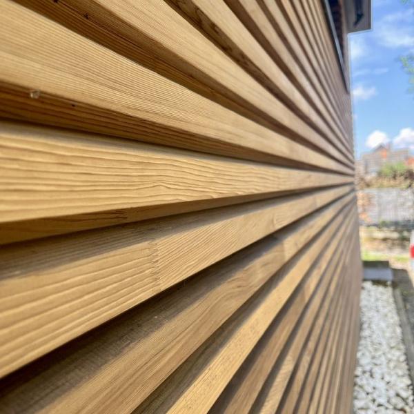 Réalisation - Rénovation bardage en bois