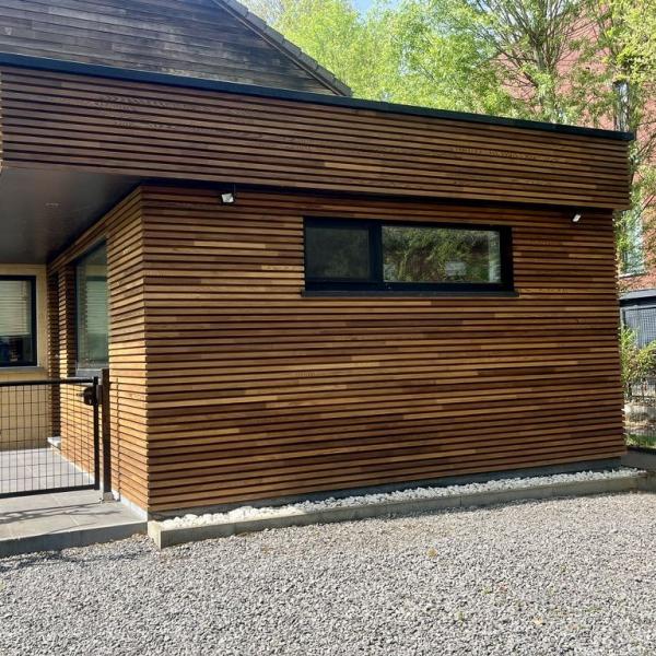 Réalisation - Rénovation bardage en bois