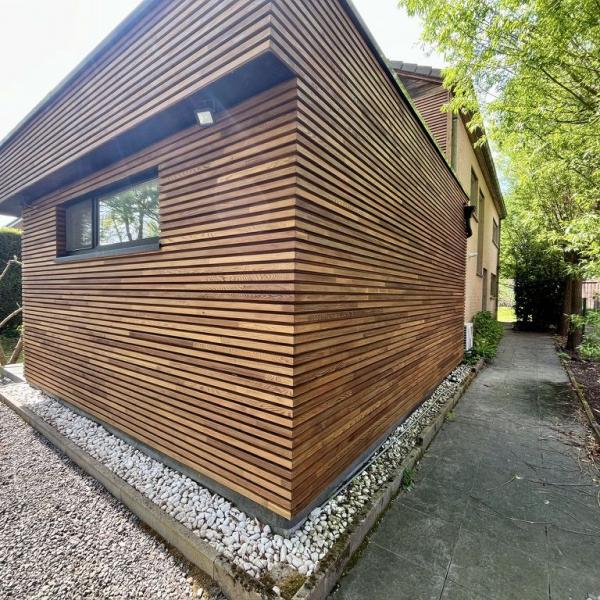 Réalisation - Rénovation bardage en bois